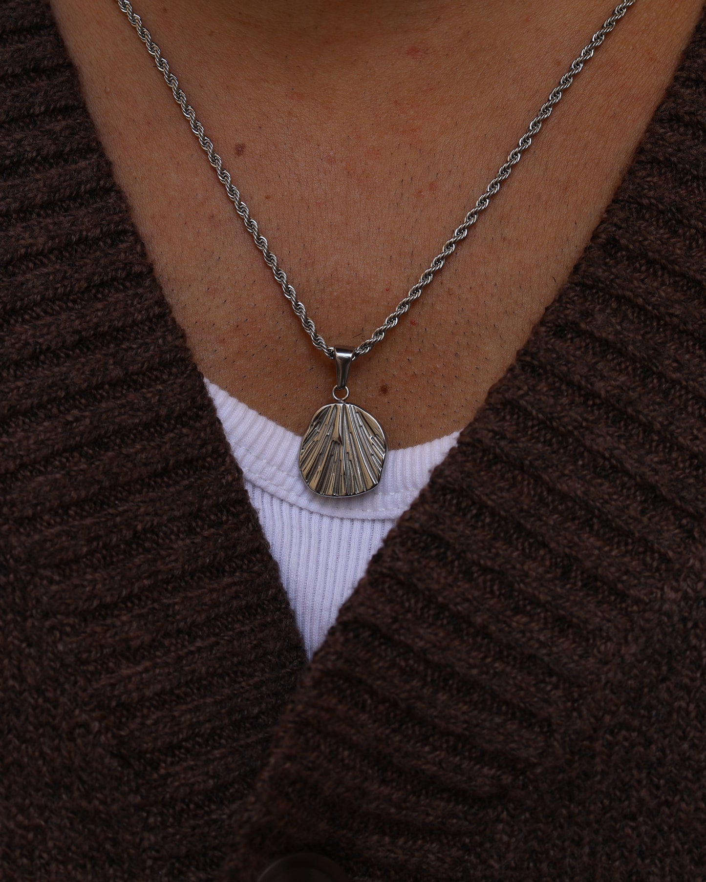Modern geometric Fragment necklace in raw 316L steel, a durable and waterproof accessory for a minimalist jewelry collection.