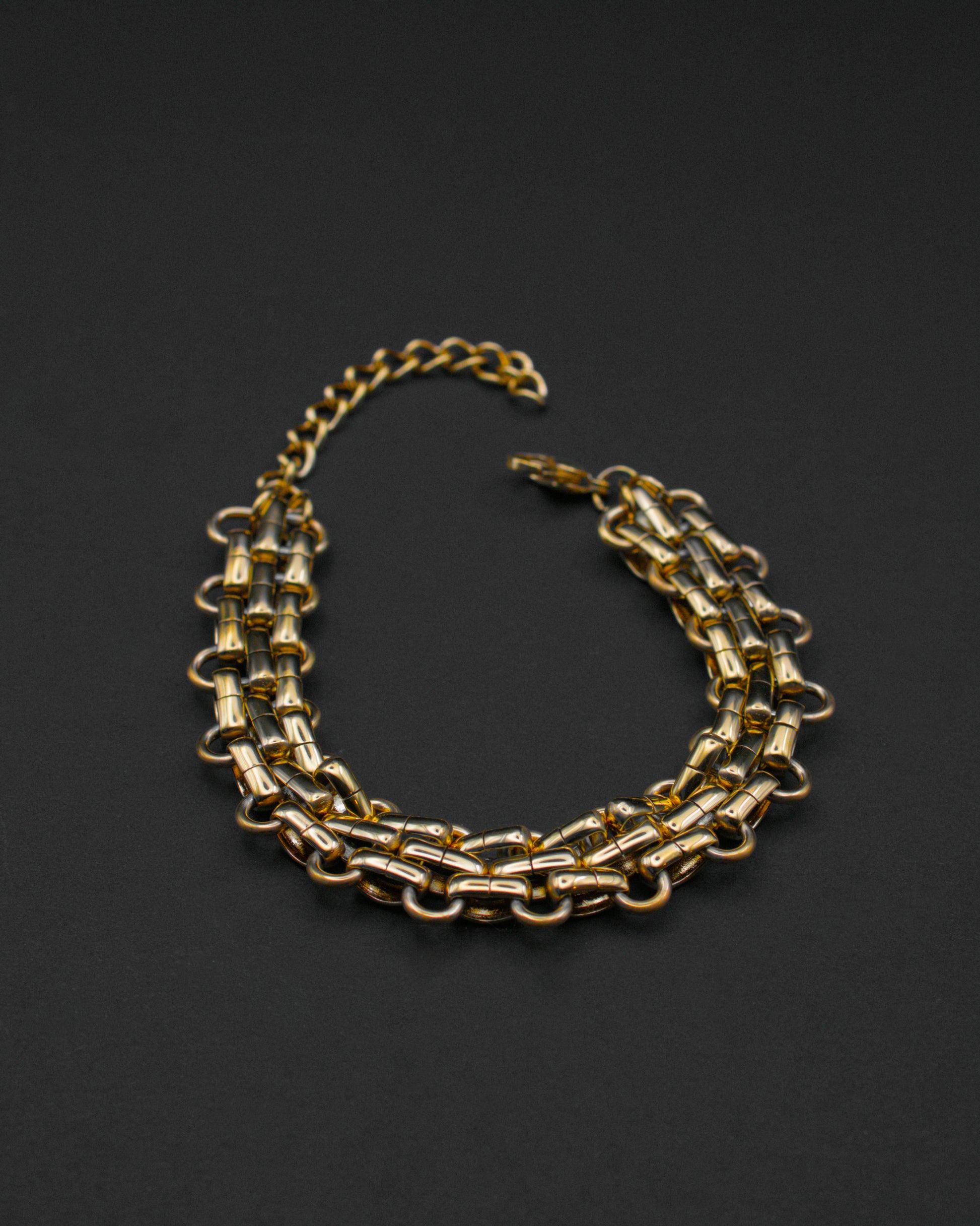 Nexus multi-chain choker in 18k gold plated 316L stainless steel by SOMBRA Jewellery.